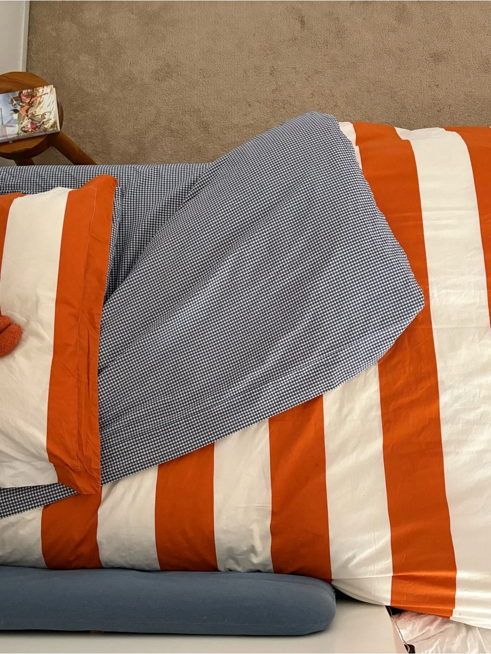 Pottery Barn Kids Orange and White Duvet cover and Navy blue gingham set.